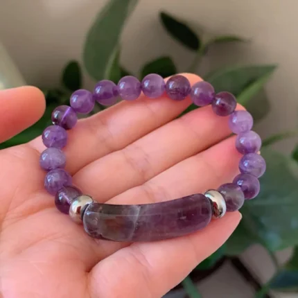 This beautiful Amethyst bracelet :comes with amethyst beads known for their calming and healing properties. Perfect for adding a touch of sophistication to any outfit. Designed to offer both beauty and benefits.