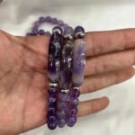 This beautiful Amethyst bracelet :comes with amethyst beads known for their calming and healing properties. Perfect for adding a touch of sophistication to any outfit. Designed to offer both beauty and benefits. - Image 3