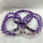 This beautiful Amethyst bracelet :comes with amethyst beads known for their calming and healing properties. Perfect for adding a touch of sophistication to any outfit. Designed to offer both beauty and benefits. - Image 2