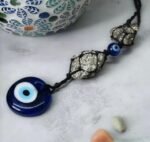 Shield Your Space and attract prosperity with Our Nazar Rakshak Hanging Charm with Evil Eye and Pyrite stone. - Image 3