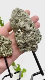 Row pyrite cluster on metal stand - Image 3